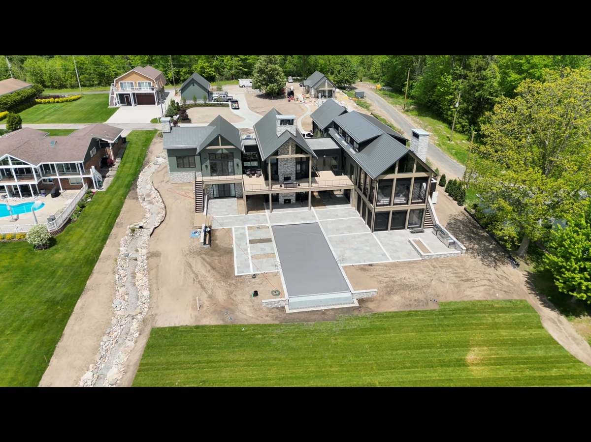 Completed luxury lakefront home aerial
