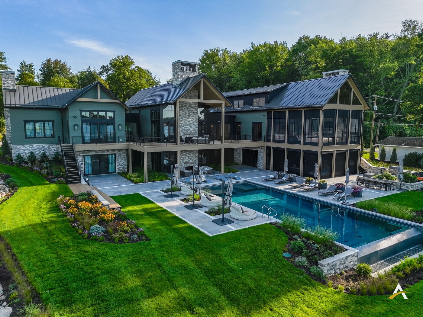 Aerial daylight view of the pool and landscaping