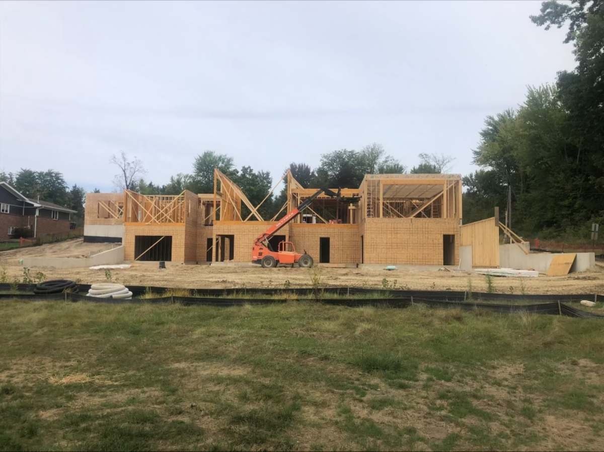 Rough framing with equipment on site